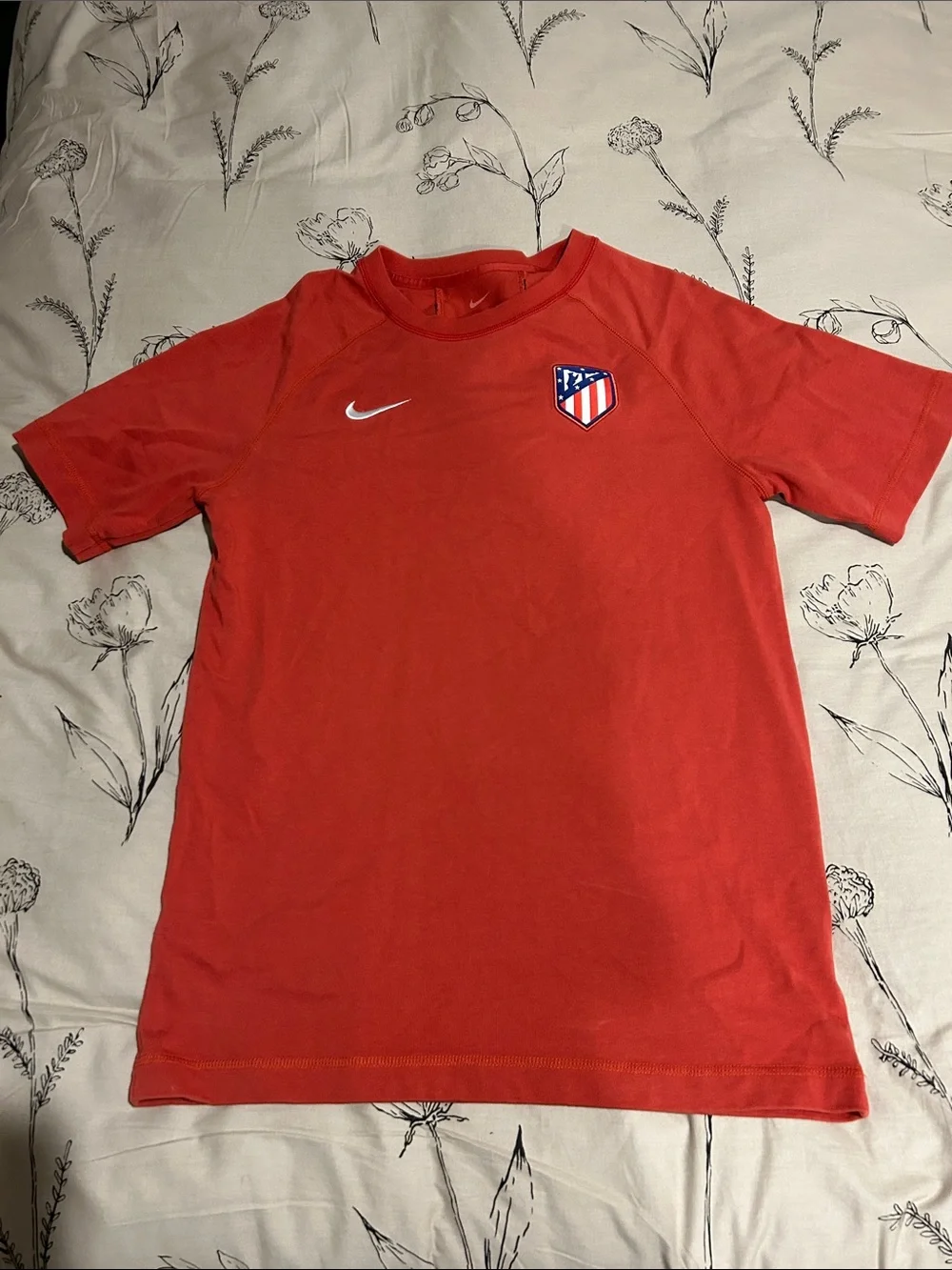 Nike Red Short-Sleeve Athletic Tee with Crest and Swoosh